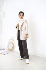Cream blazer in brown checked cuff