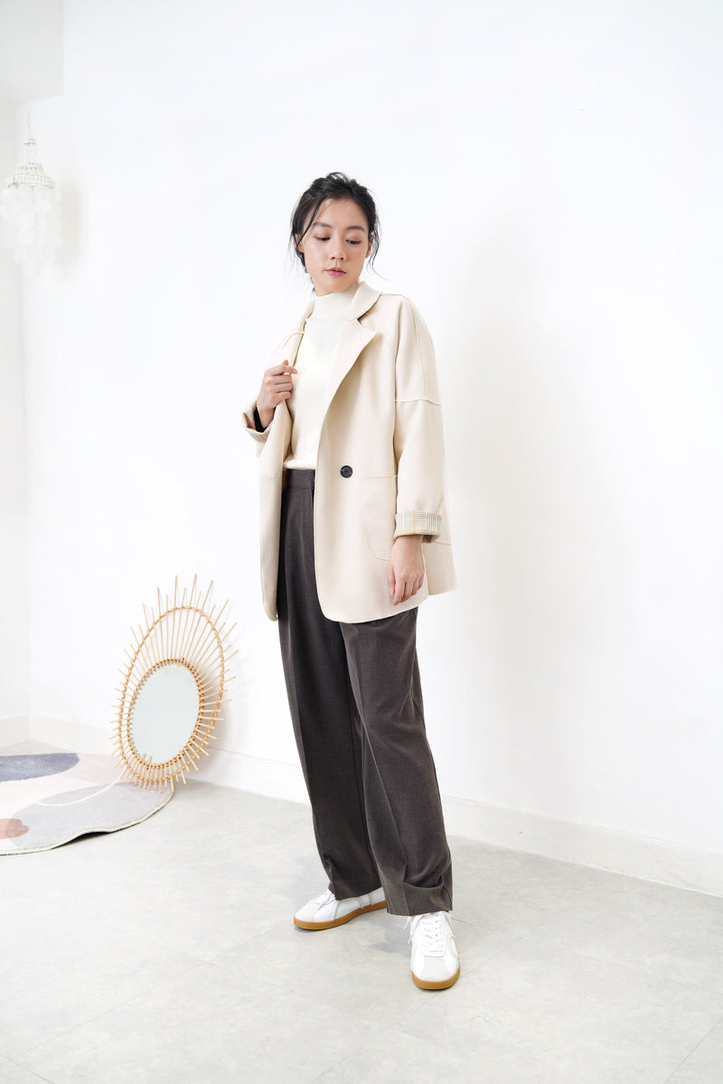 Cream blazer in brown checked cuff