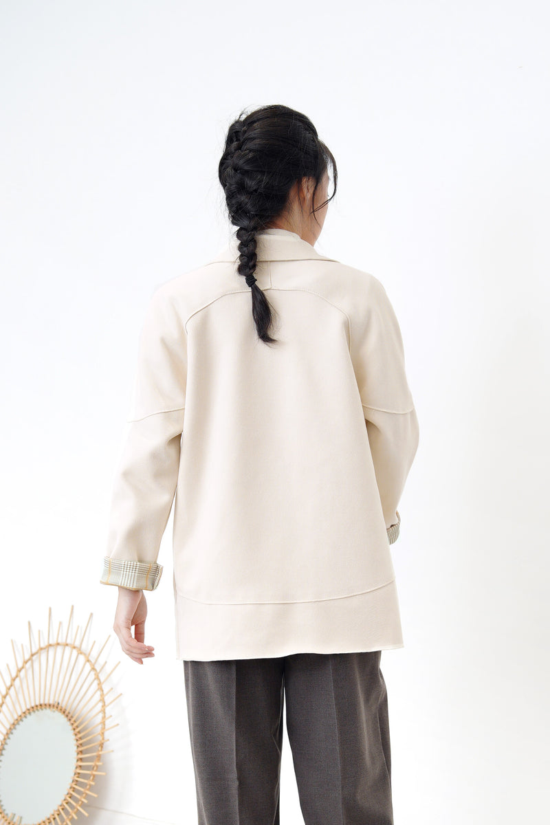 Cream blazer in brown checked cuff