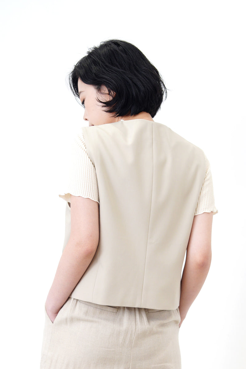 Beige premium vest jacket in round hem