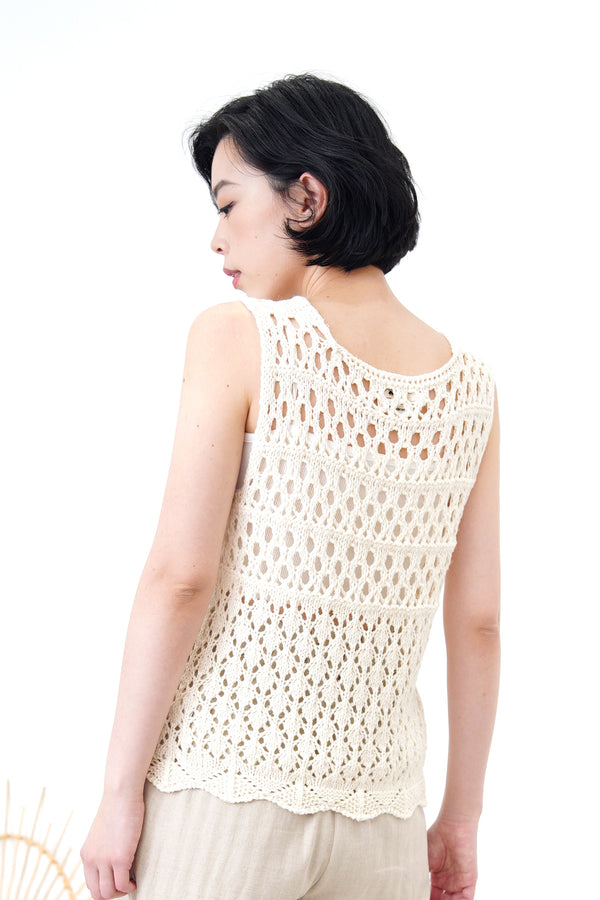 Ivory crochet vest in wavy hem