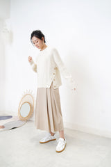 Ivory twist pattern sweater w/ side vent buttons