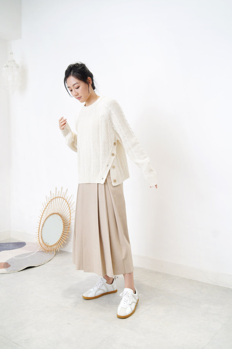 Ivory twist pattern sweater w/ side vent buttons