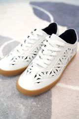 Off white sneakers in cage work