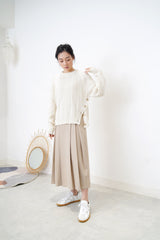 Ivory twist pattern sweater w/ side vent buttons