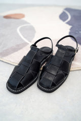 Black outline stitching sandals in weave style