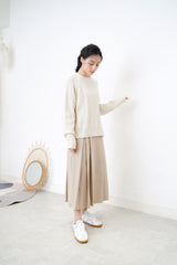 Ivory twist pattern sweater w/ side vent buttons