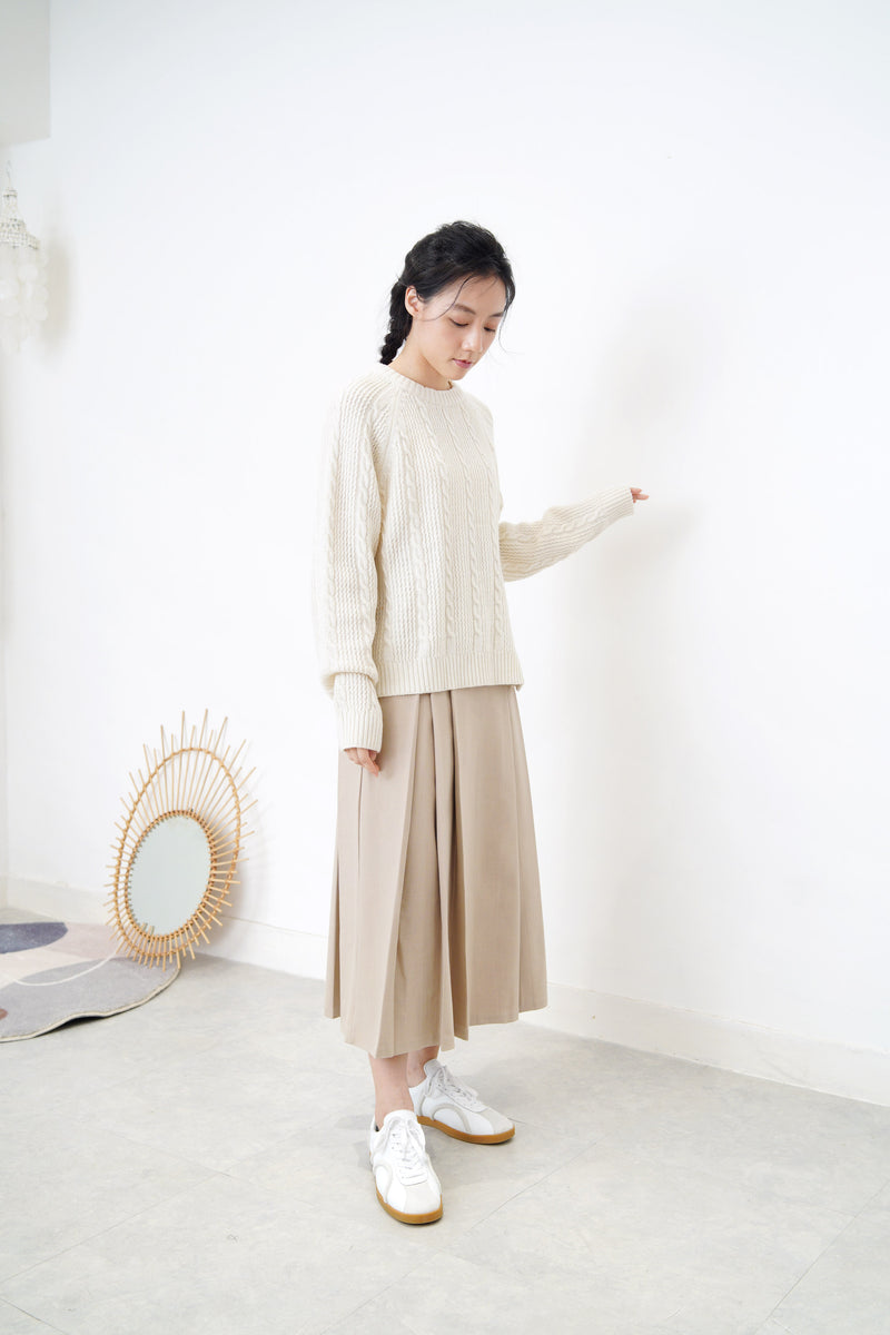 Ivory twist pattern sweater w/ side vent buttons