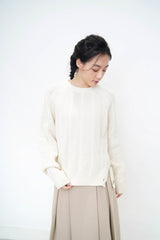 Ivory twist pattern sweater w/ side vent buttons