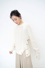 Ivory twist pattern sweater w/ side vent buttons