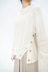 Ivory twist pattern sweater w/ side vent buttons