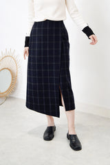 Black checked wool skirt in asy. hem