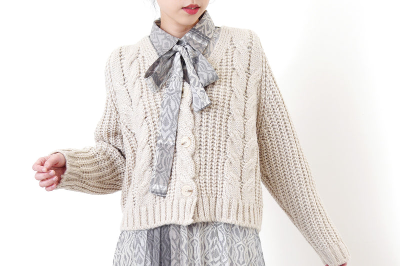 Grey wool cardigan in twist details pattern