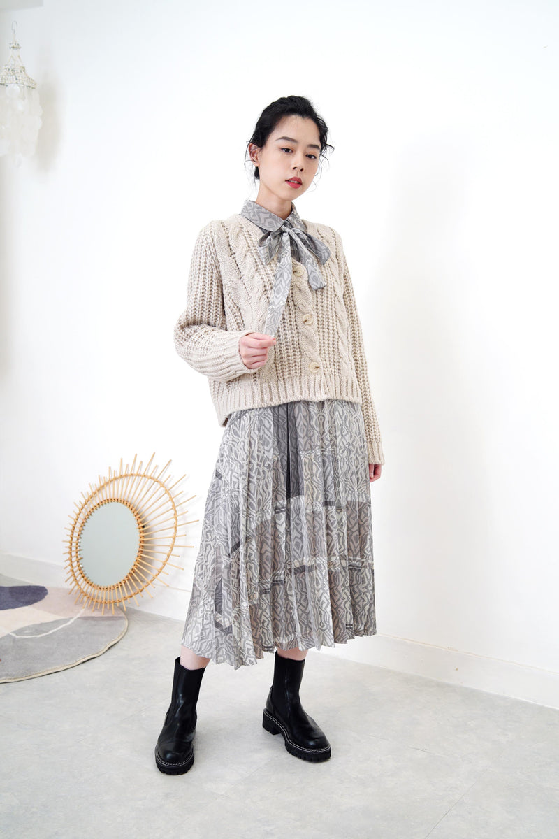 Grey wool cardigan in twist details pattern