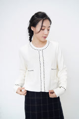 White cardigan in stitch details