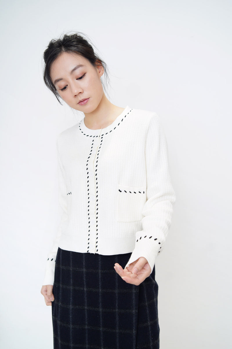 White cardigan in stitch details
