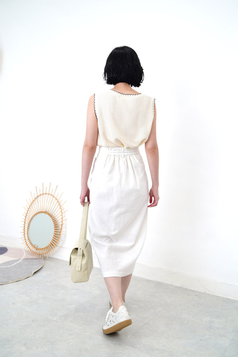 Cream crop cut vest w/ contrast stitching