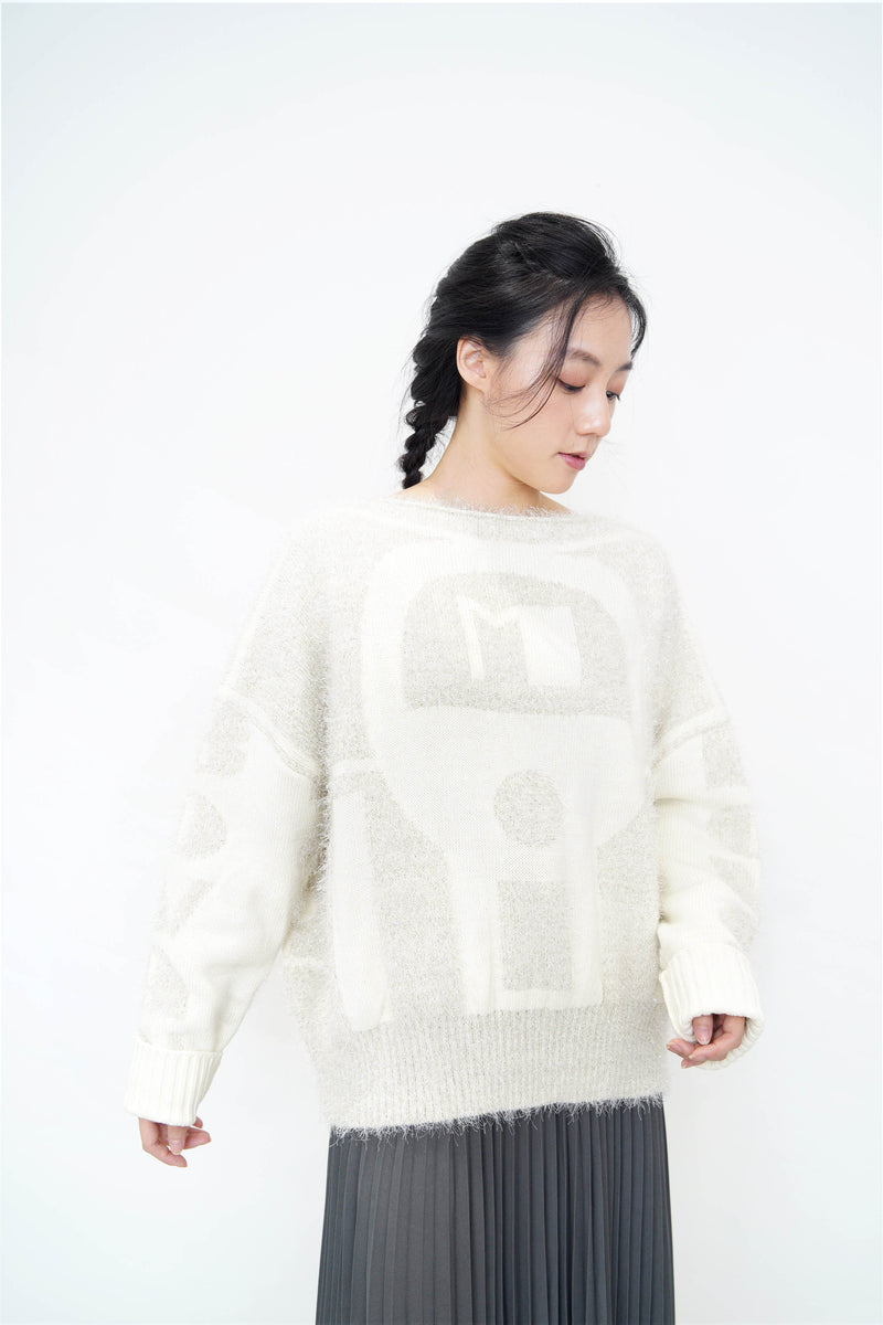 White sweater in silver glittering