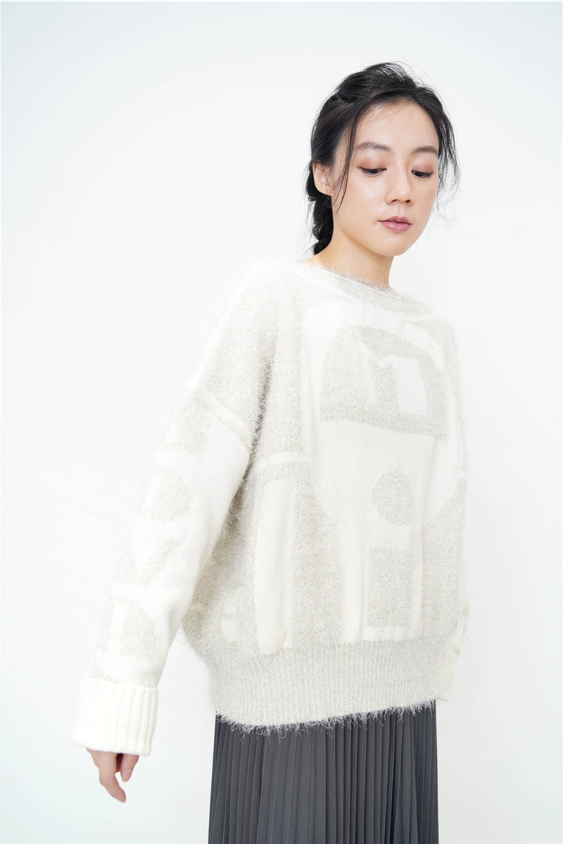 White sweater in silver glittering