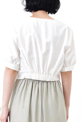 White shirt blouse in knot hem