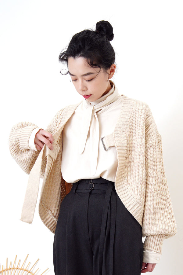 Beige knit cardigan in strap buckle