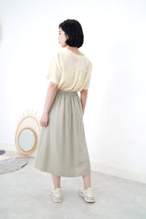 Light yellow v neck smooth shirt