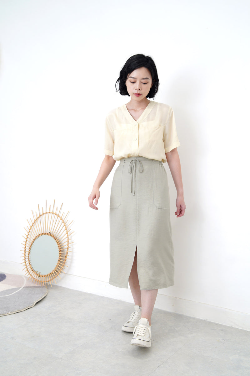 Light yellow v neck smooth shirt