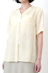 Light yellow v neck smooth shirt