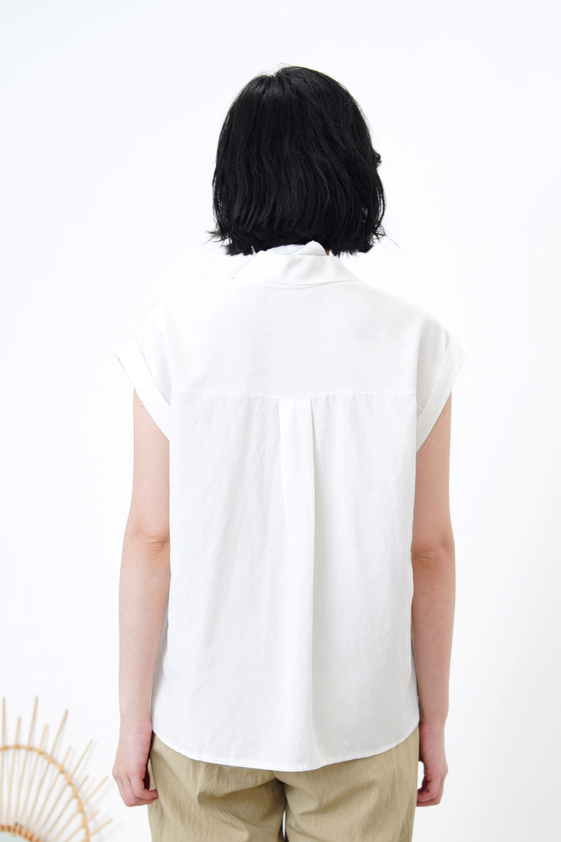 White v neck shirt vest