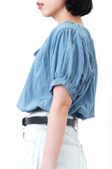 Blue string blouse w/ elastic waist hem