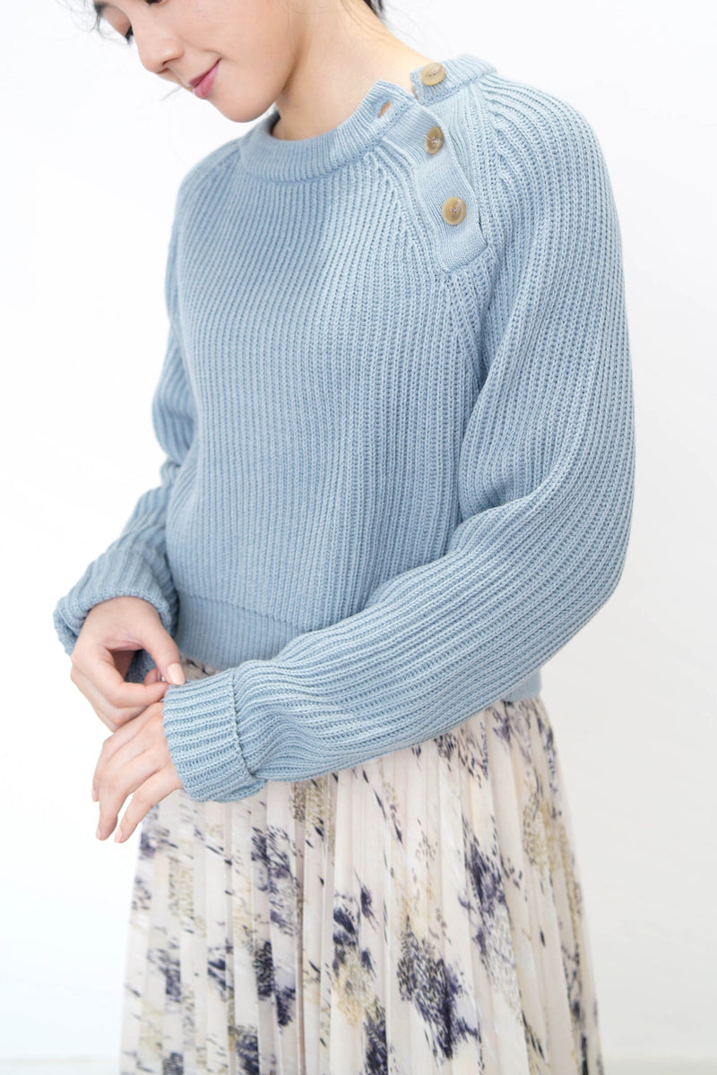 Baby blue crop sweater w/ buttons detail
