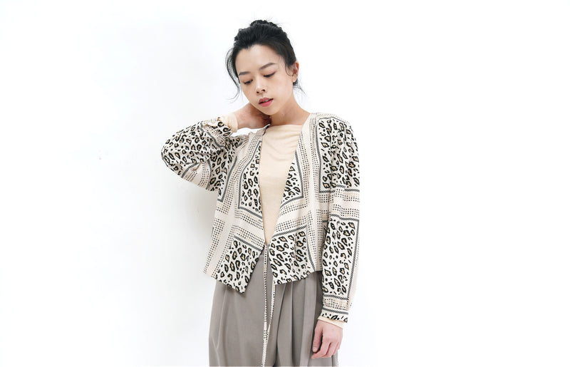 Wrap style blouse in animal print