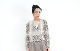 Wrap style blouse in animal print