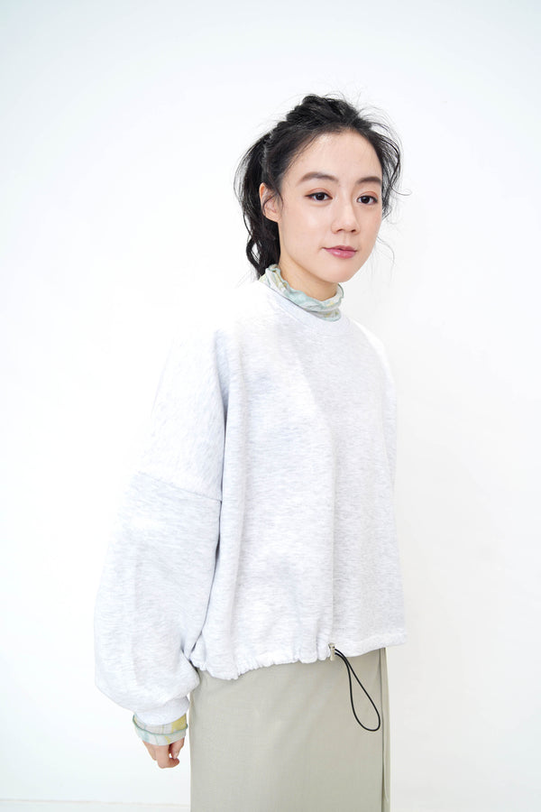 light grey pullover w/ elastic string hem