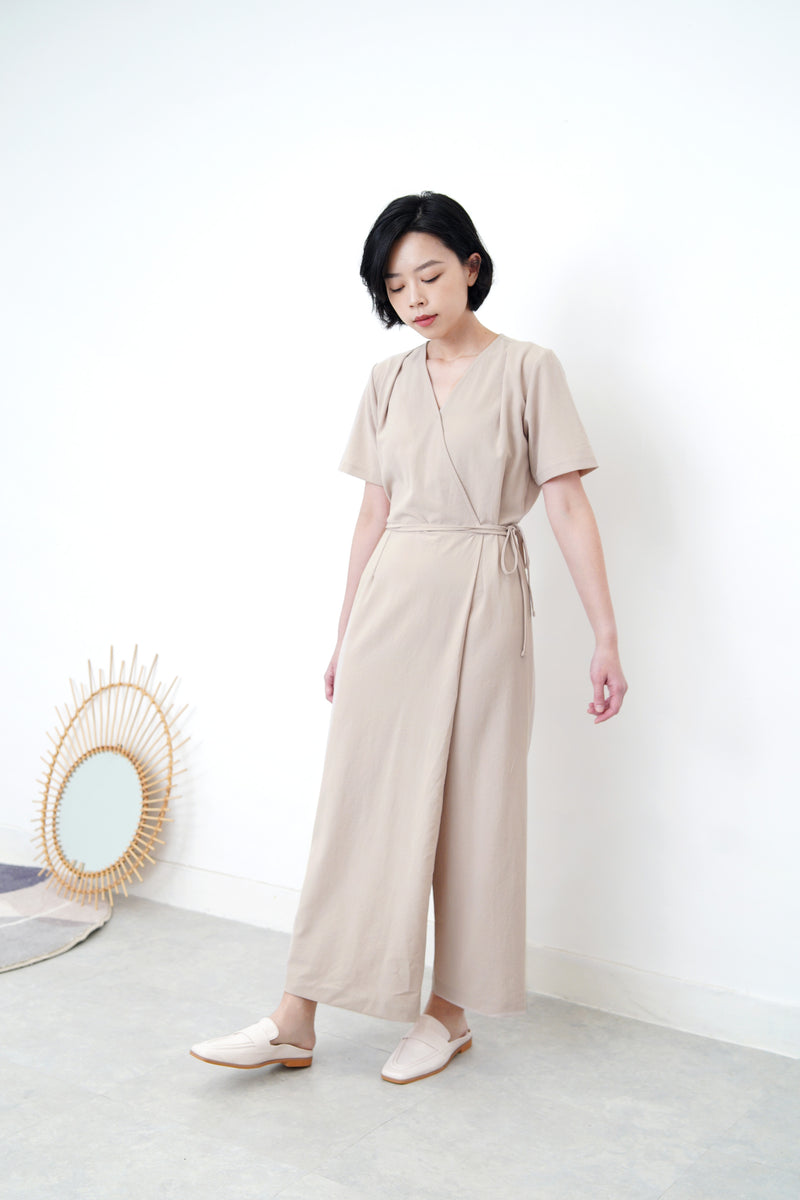 Beige v neck jumpsuit w/ side waist strings