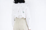 White shirt in floral embroidery