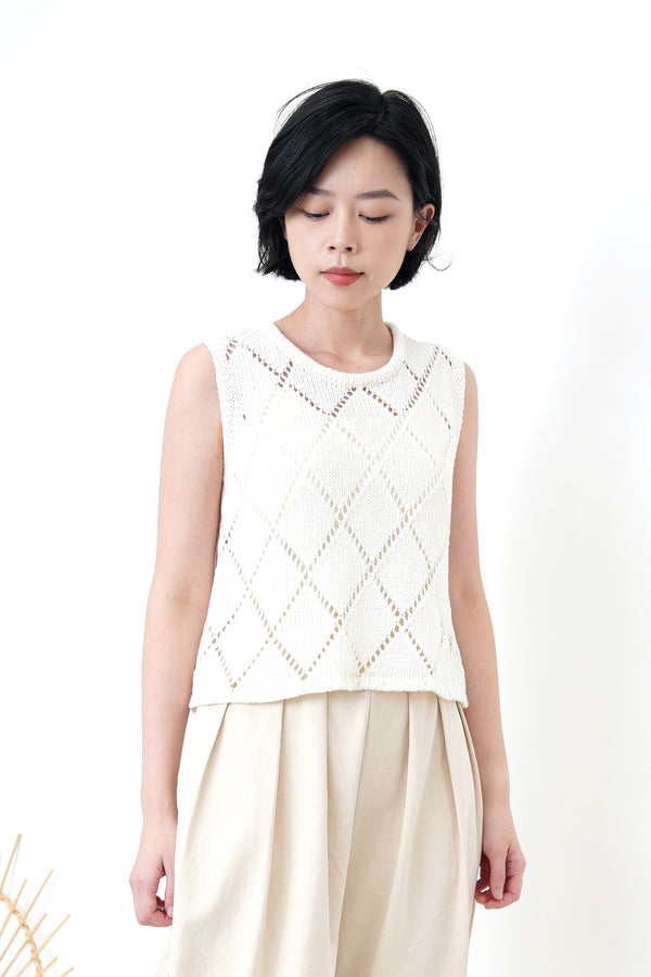 Ivory crochet vest in diamond pattern