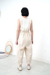 Ivory pleats trousers w/ straps