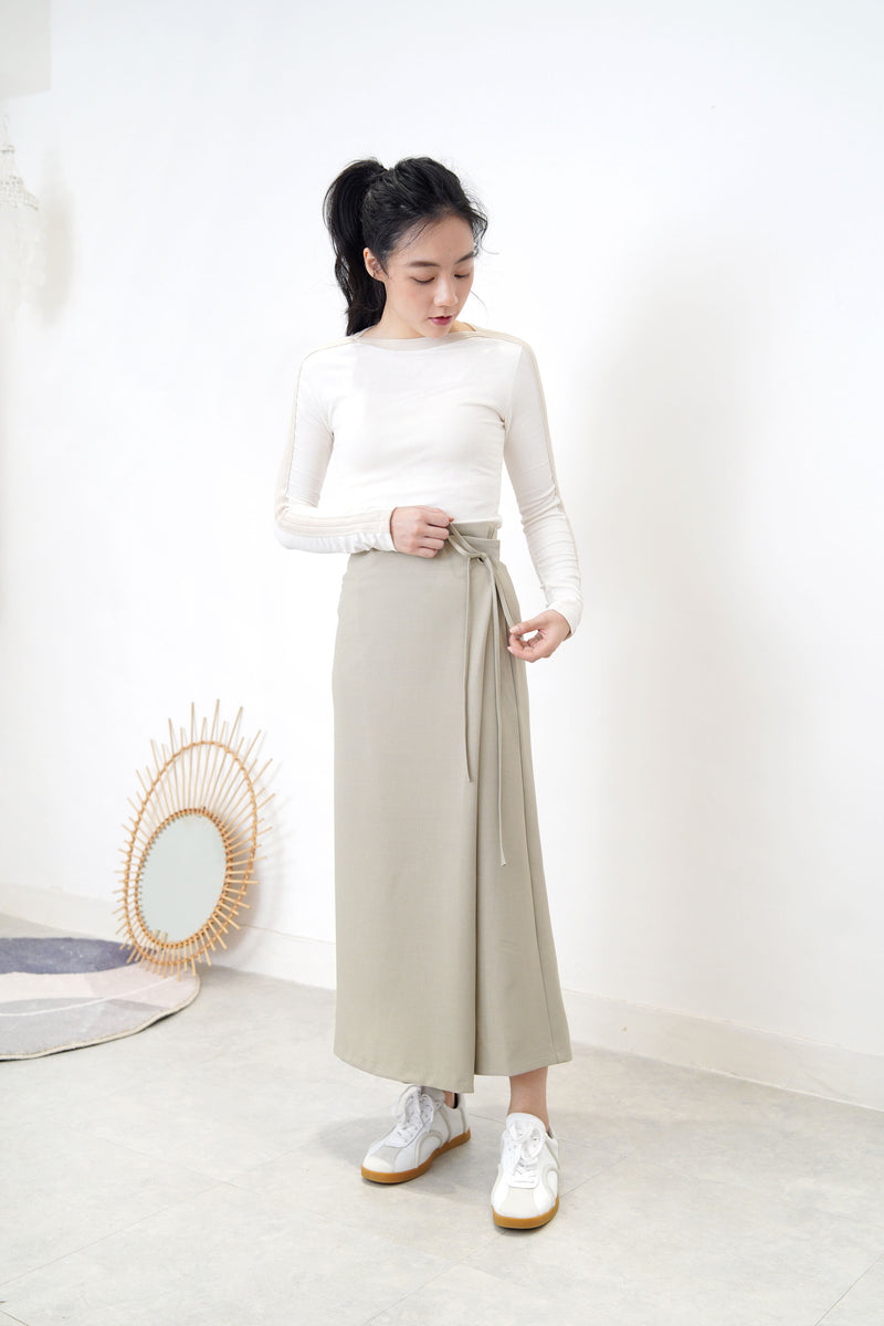 Green h cut skirt w/ string waist details