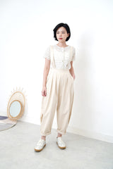 Ivory pleats trousers w/ straps