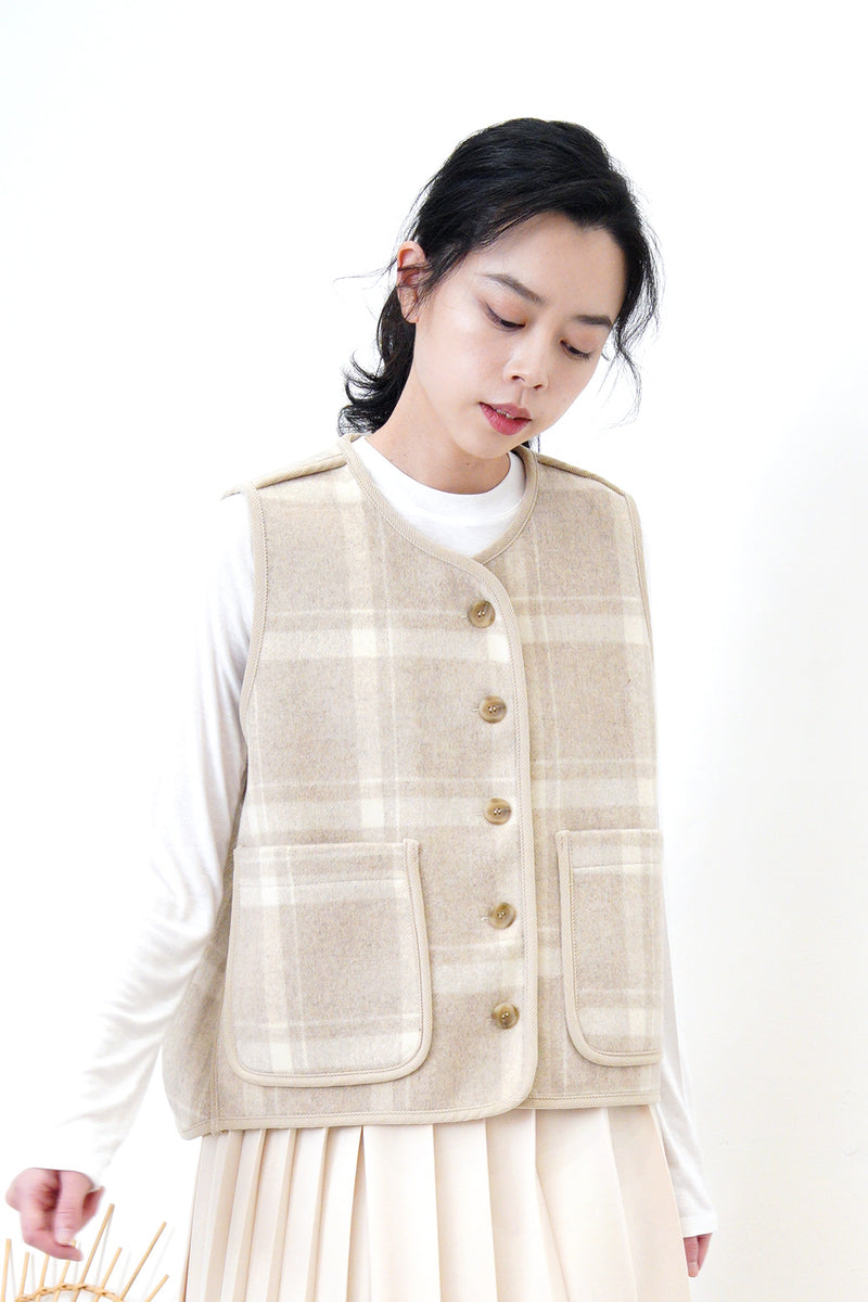 Double sided wool vest in checked pattern