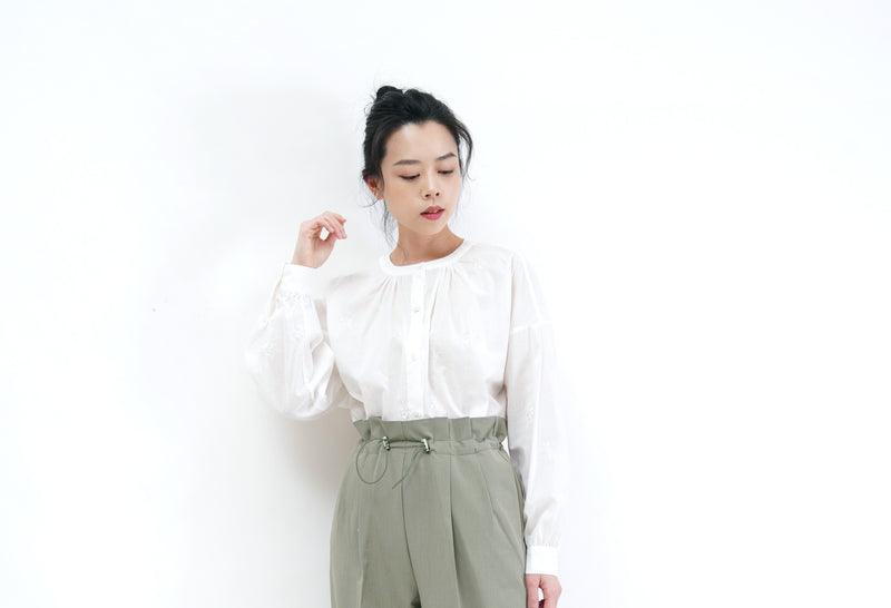 White stand collar shirt w/ floral embro.