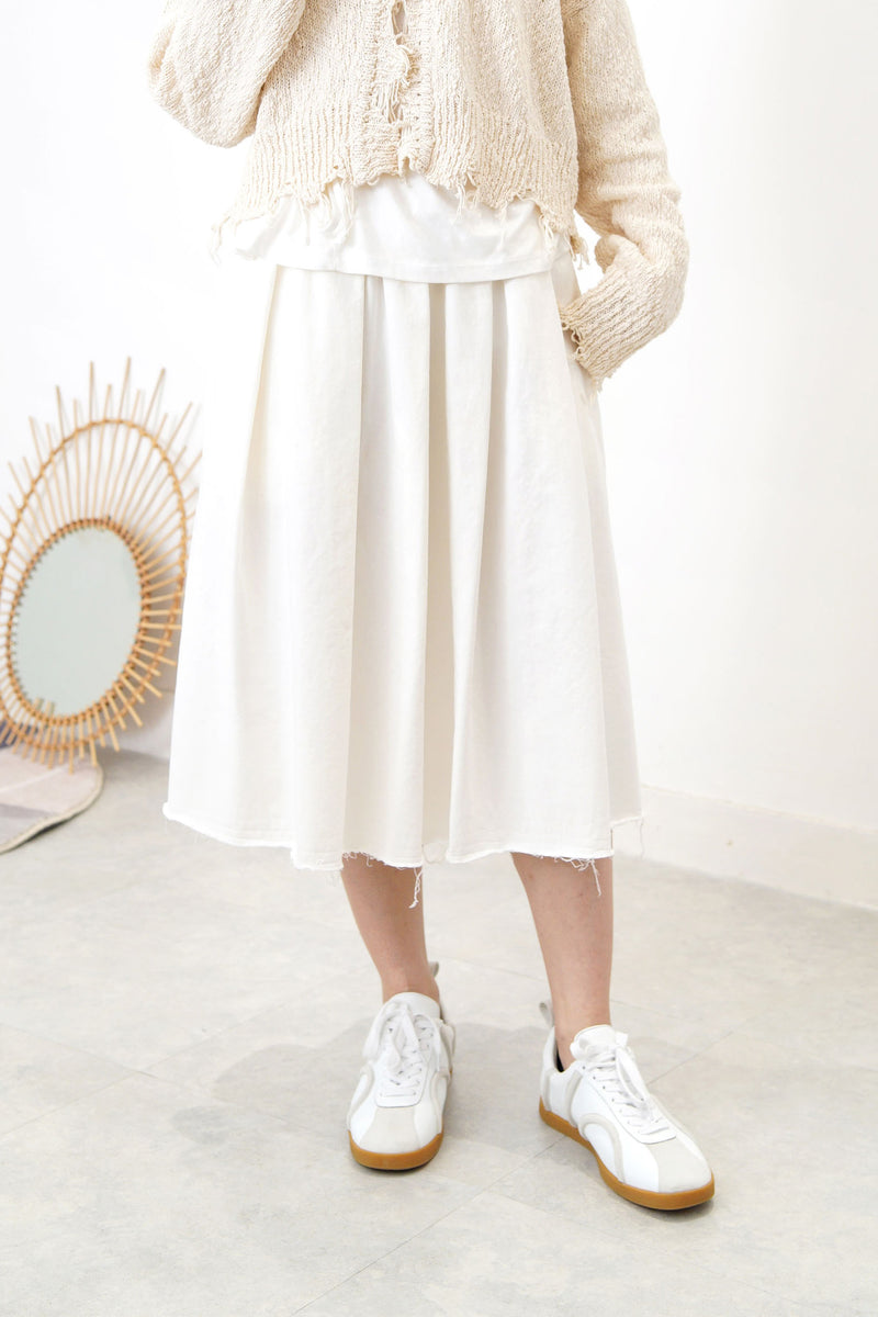 White A cut flare skirt in fringe trimming