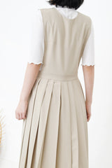 Beige v neck one piece in pleats