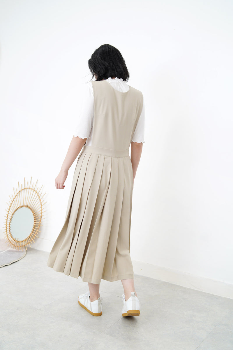 Beige v neck one piece in pleats