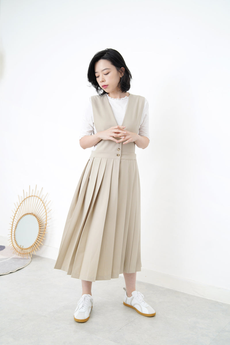 Beige v neck one piece in pleats