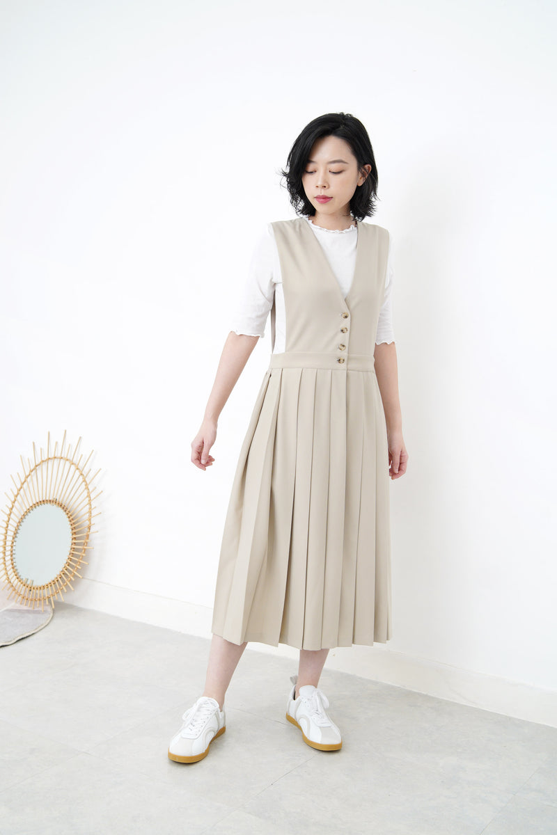 Beige v neck one piece in pleats