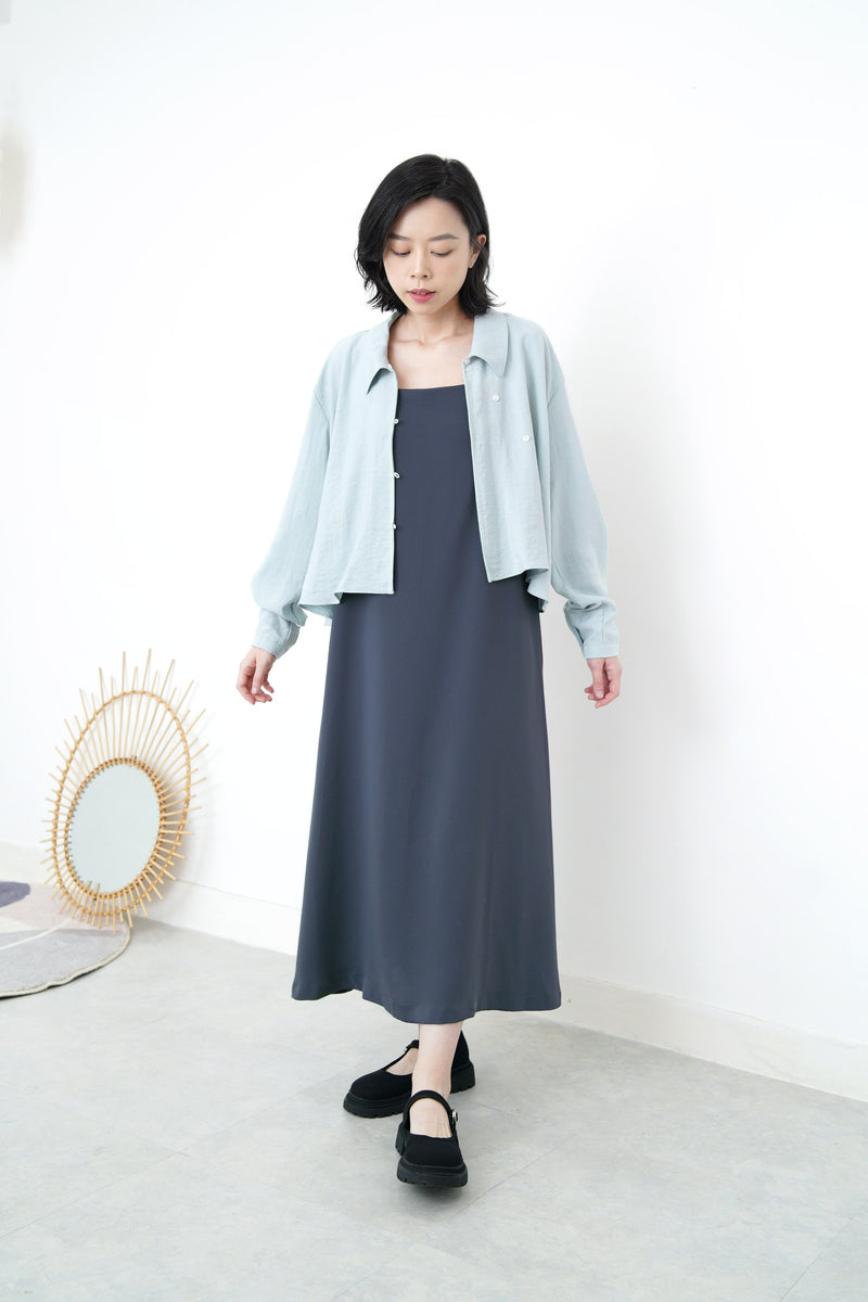 Baby blue crop blouse in asymmetric buttons