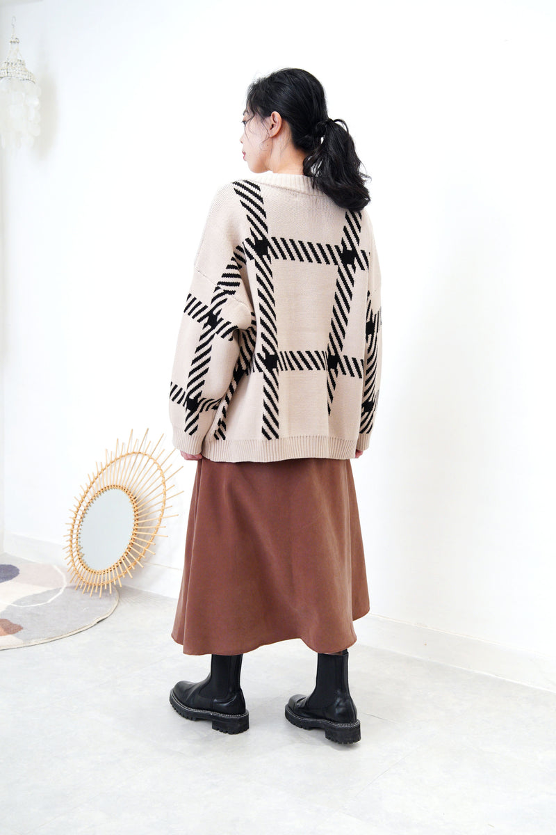 Beige loose cut cardigan in check pattern