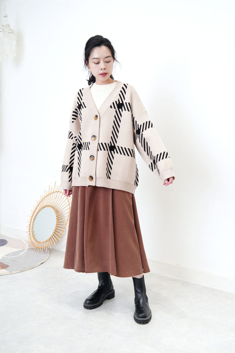 Beige loose cut cardigan in check pattern